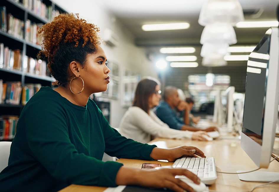 young business women focused on computer in office