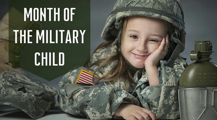 Little girl wearing a military uniform. “Month of the military child.”