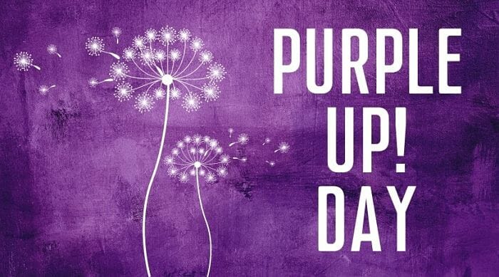 Dandelion on a purple background with text Purple Up Day!