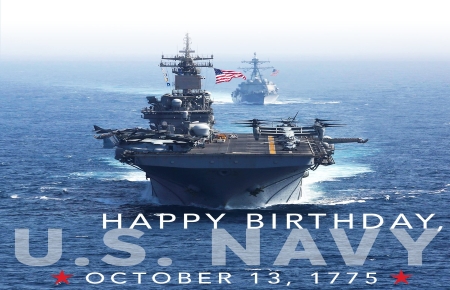 Two large naval ships in open waters facing the camera waving American flags, Happy Birthday U.S. Navy-October 13.