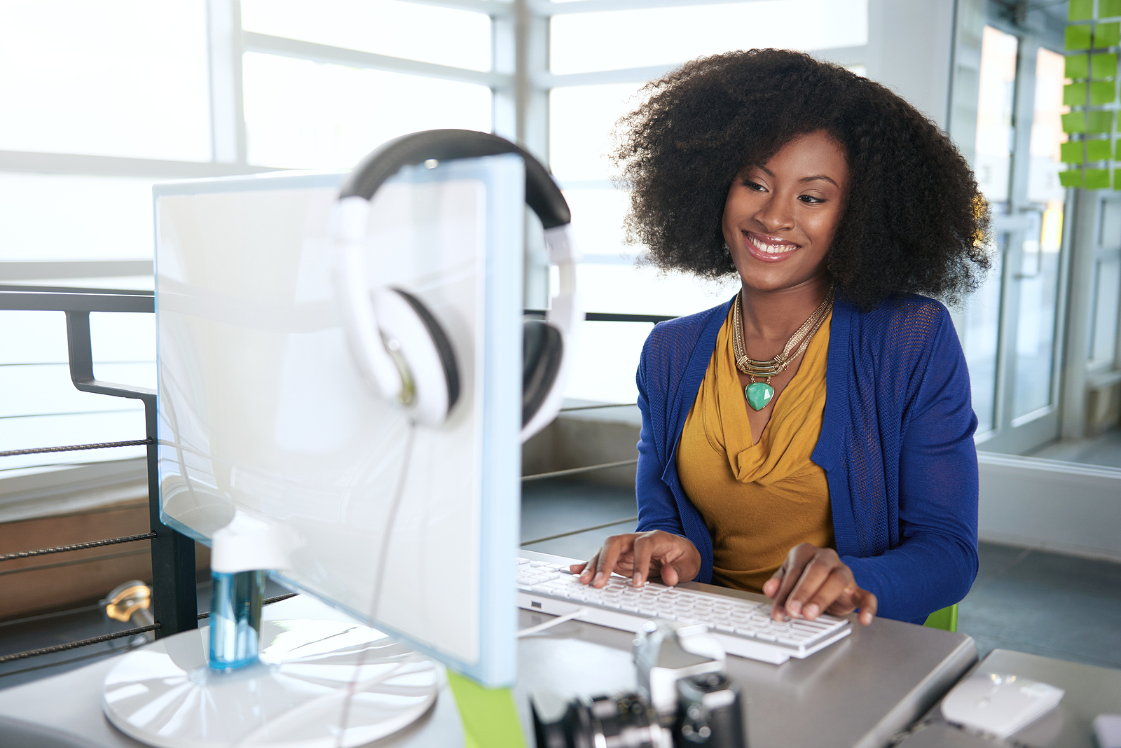 business woman working at a desktop computer